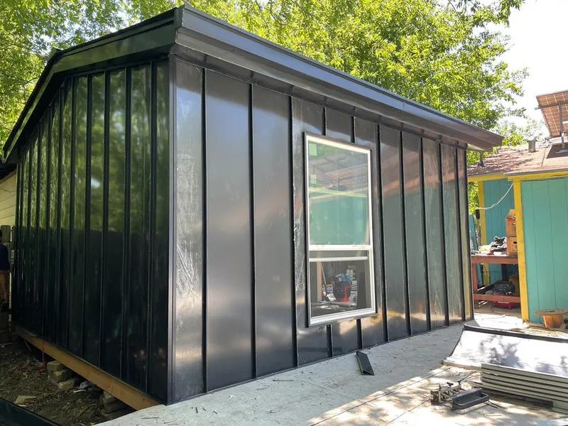 Black standing seam metal wall panels for Roof Inspection in Bel Aire