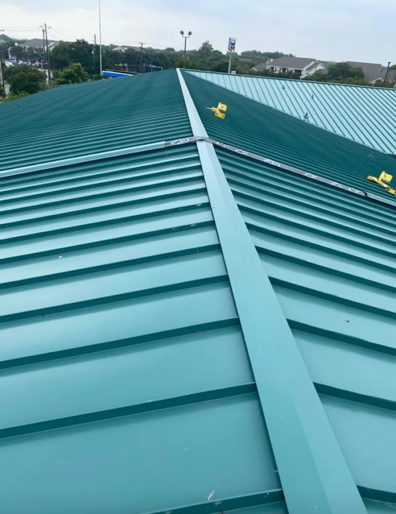Green commercial metal roof ridge and valley for Metal Roof Repair in Bel Aire